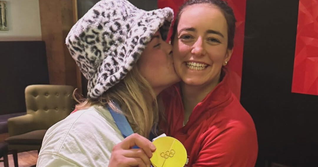 Out skier wins Olympic gold — and celebrates with her athlete ...