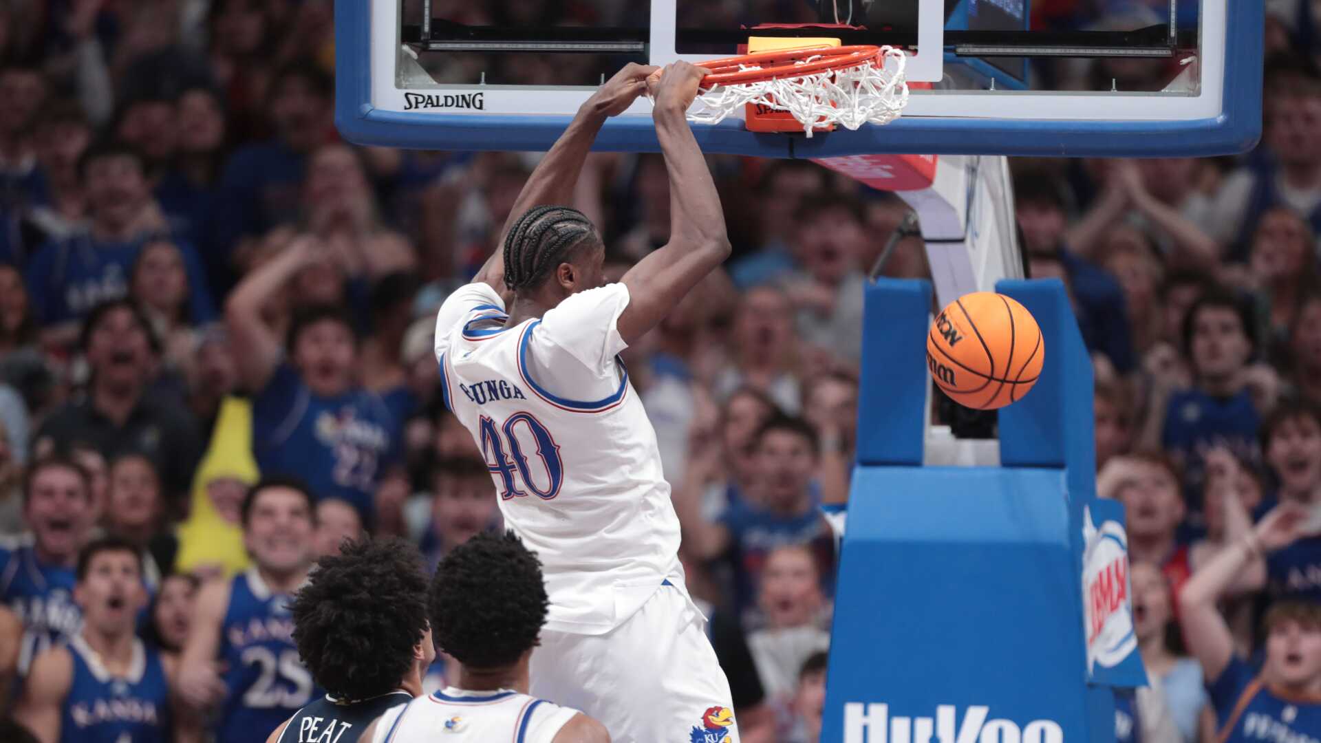 No. 9 Kansas beats top-ranked and previously undefeated Arizona 82-78