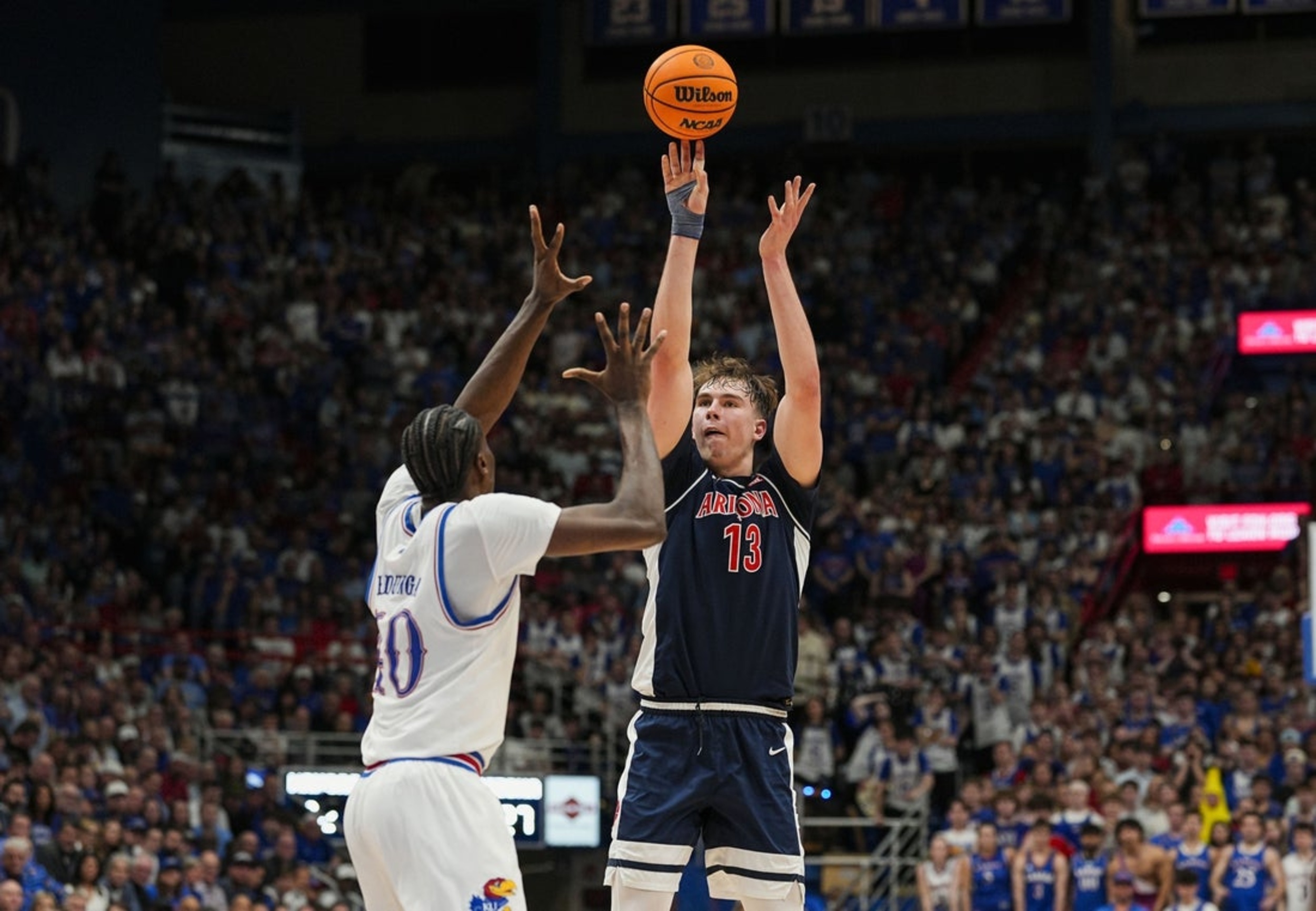 No. 9 Kansas rallies to end No. 1 Arizona's unbeaten run