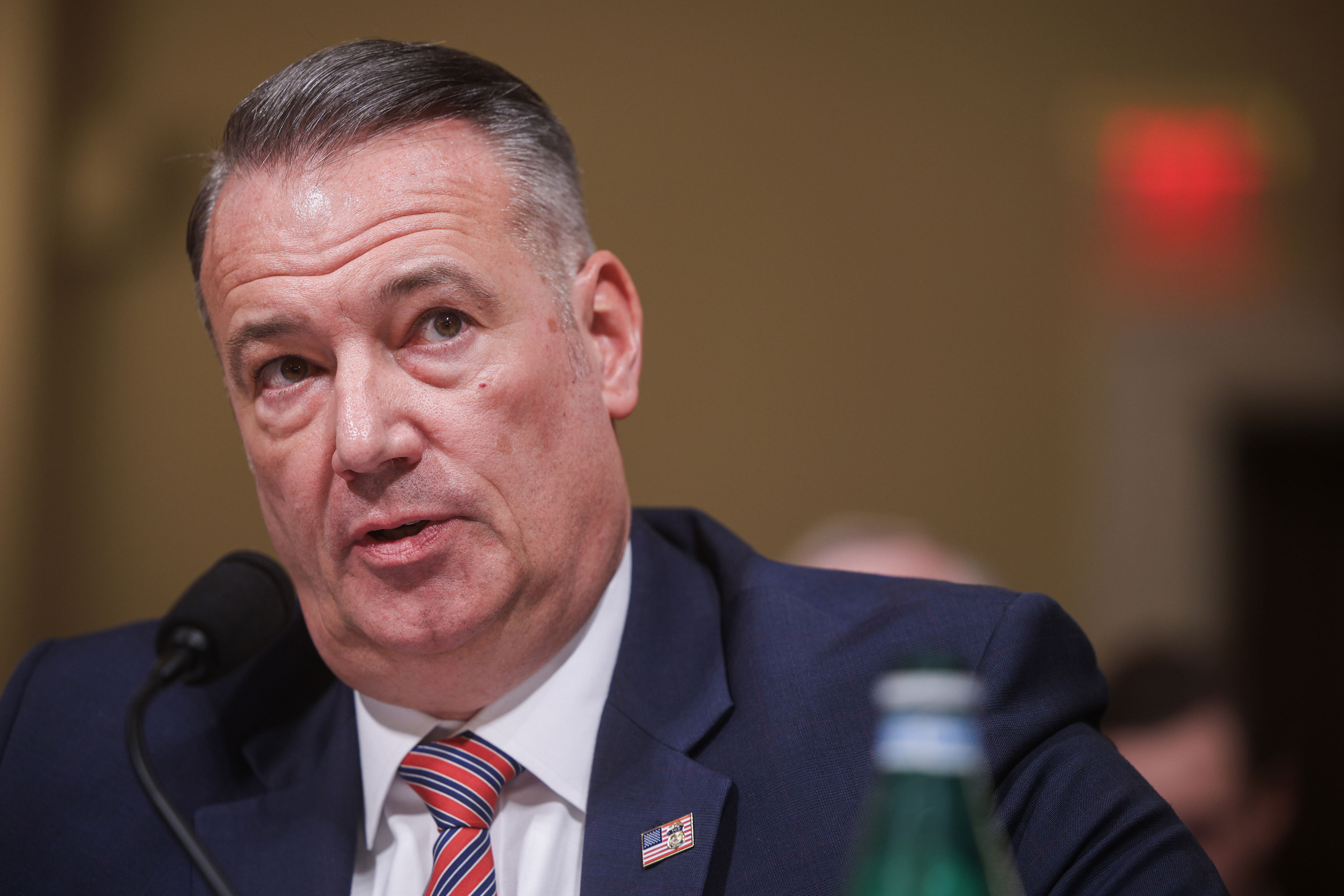 ICE chief spars with Democrat over 'secret police' label