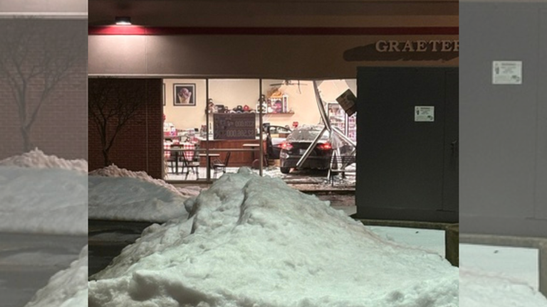 Video: Car crashes through Graeter's storefront window