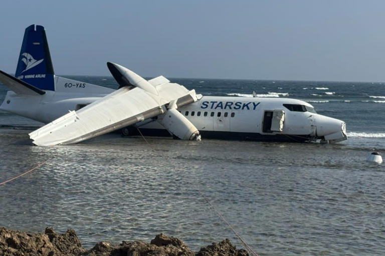 Passengers walk away after plane ends up in ocean