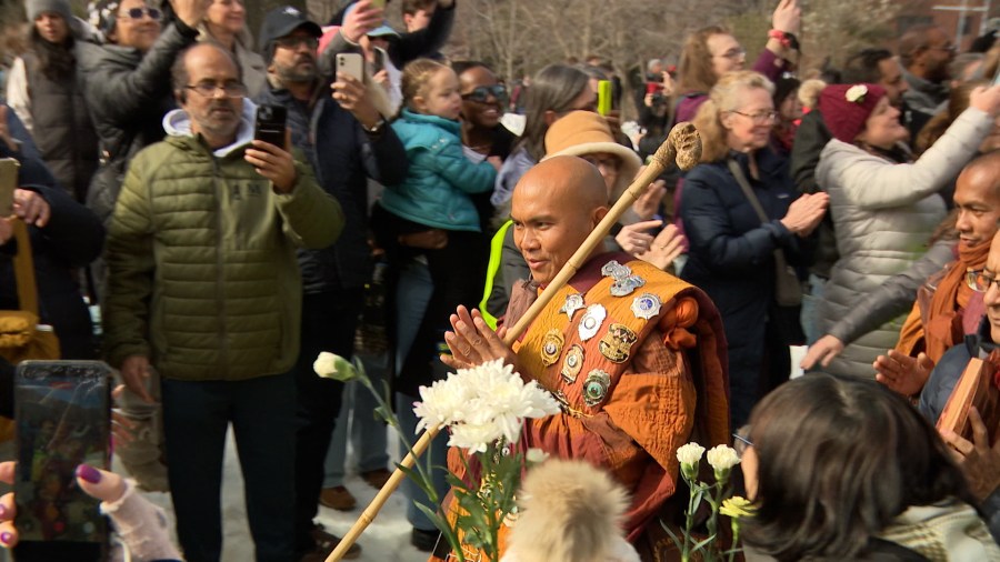 Buddhist monks stop at the National Cathedral during 