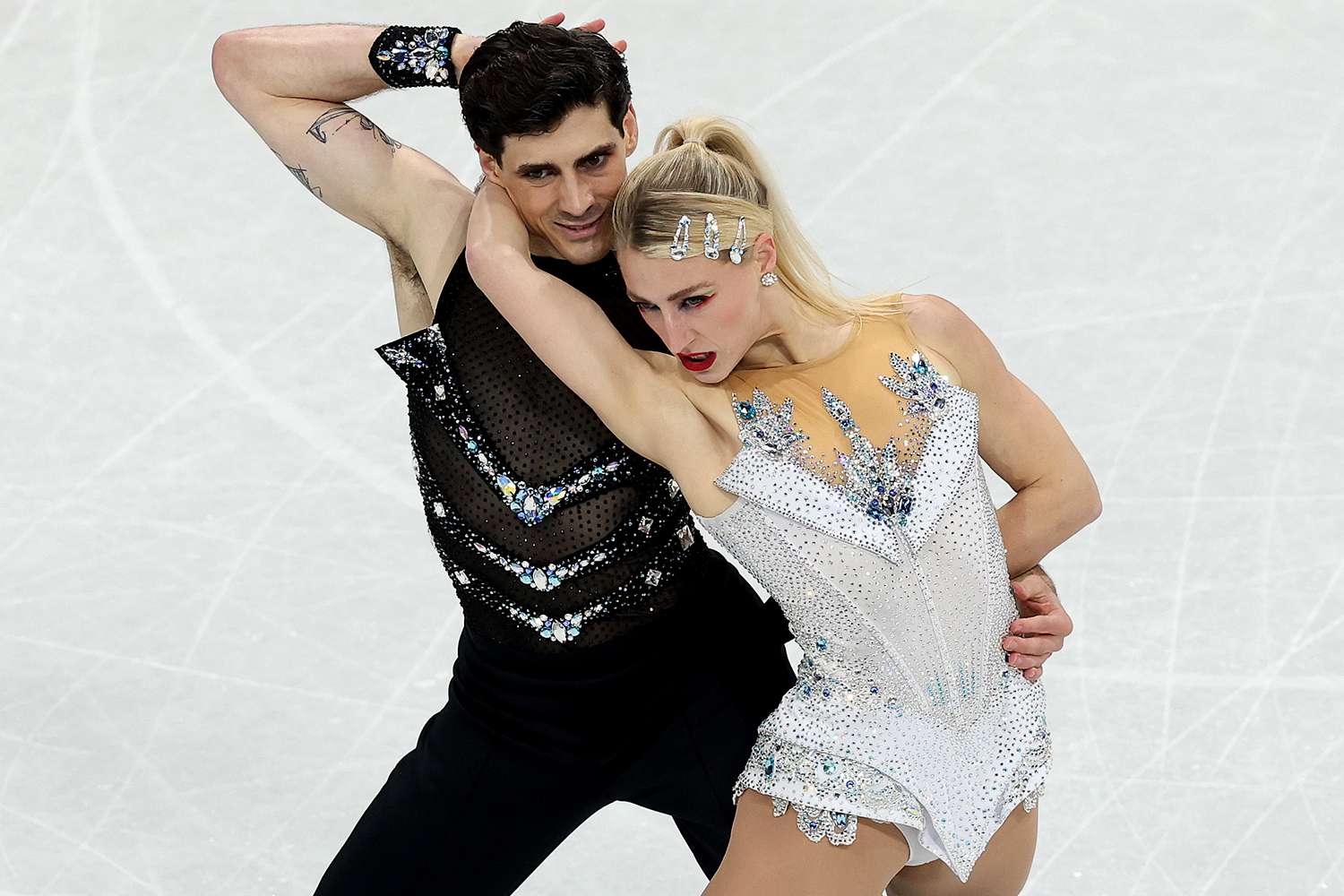 Ice dancers wow fans with unbelievable wardrobe malfunction save at ...