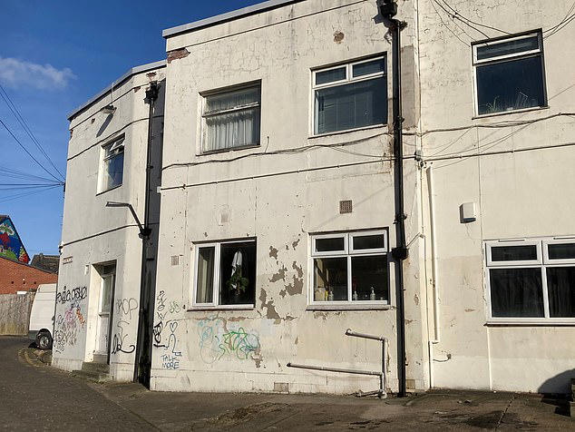 He is now living in a small bedsit in graffiti-covered converted flats in the Headingley area of Leeds (Pictured) 