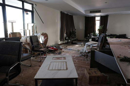 A private room where managers overseeing scam operations stayed, is amid debris inside a compound in O'Smach used for scam operations, at the Chong Chom-O'Smach border crossing, which was bombed and occupied by the Thai military in December following clashes between Thailand and Cambodia along a disputed border area, in Samraong, Oddar Meanchey province, Cambodia, February 2, 2026. REUTERS/Chalinee Thirasupa