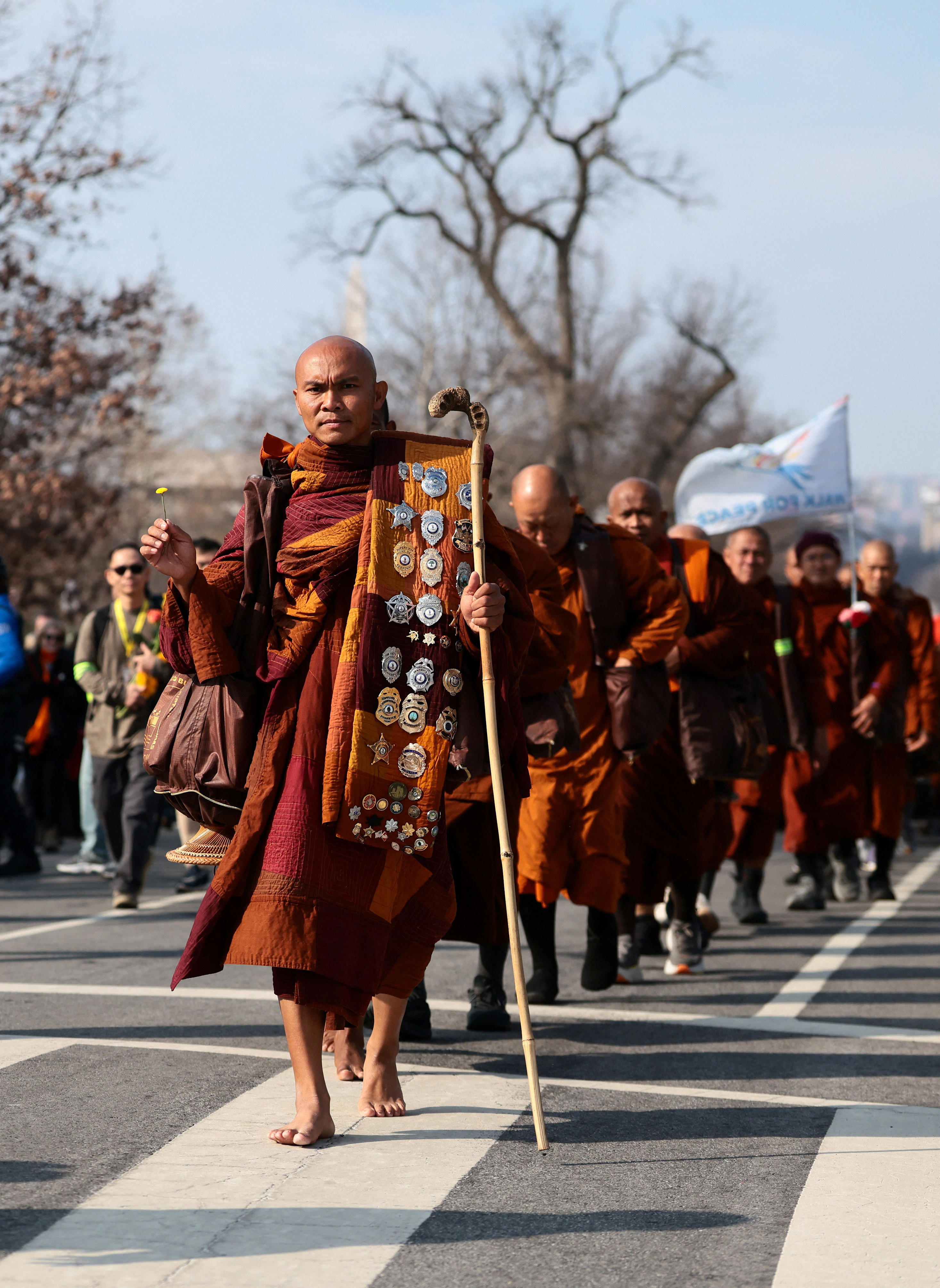 Buddhist monks end peace walk with message: 'Stop before hurting'