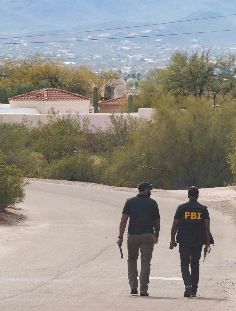 Rebecca Noble/Reuters - PHOTO: Investigators canvasses Annie Guthrie's neighborhood after the disappearance of Nancy Guthrie, the 84-year-old mother of U.S. journalist and television host Savannah Guthrie, who went missing from her home in Tucson, Feb. 10, 2026.