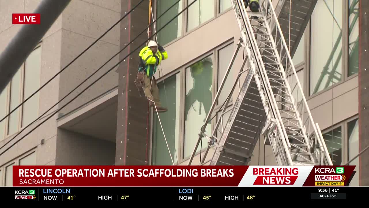 Sacramento crews work to rescue 2 stuck high up on building