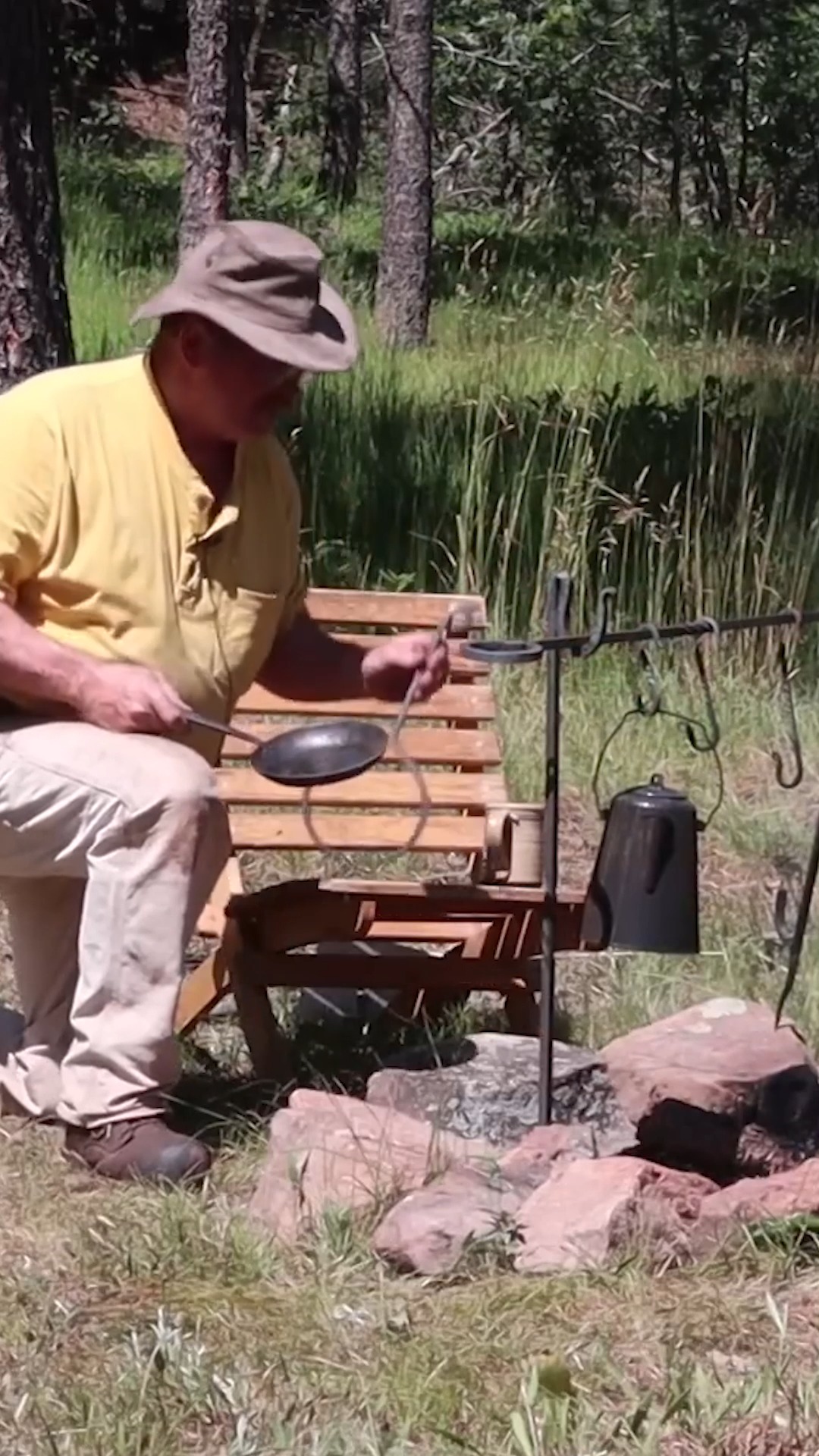 Forging a skillet holder for campfires