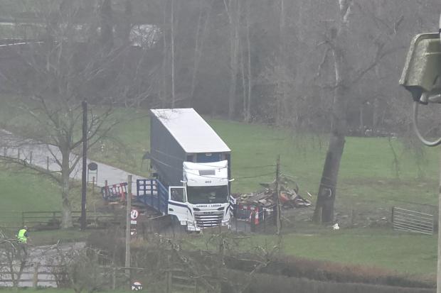 Lorry plunges into river after bridge incident