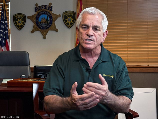 Pima County Sheriff Chris Nanos is reportedly instructing his team to conduct polygraph tests as his department continues to search for Nancy Guthrie. The sheriff is pictured here on February 13 during an interview with Reuters 