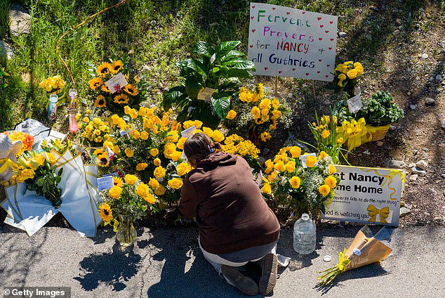Nancy Guthrie has been missing for 18 days. Several leads have turned up short in law enforcement's search for her whereabouts. Community members are seen on Wednesday placing flowers and messages of support outside Nancy's Tucson home  