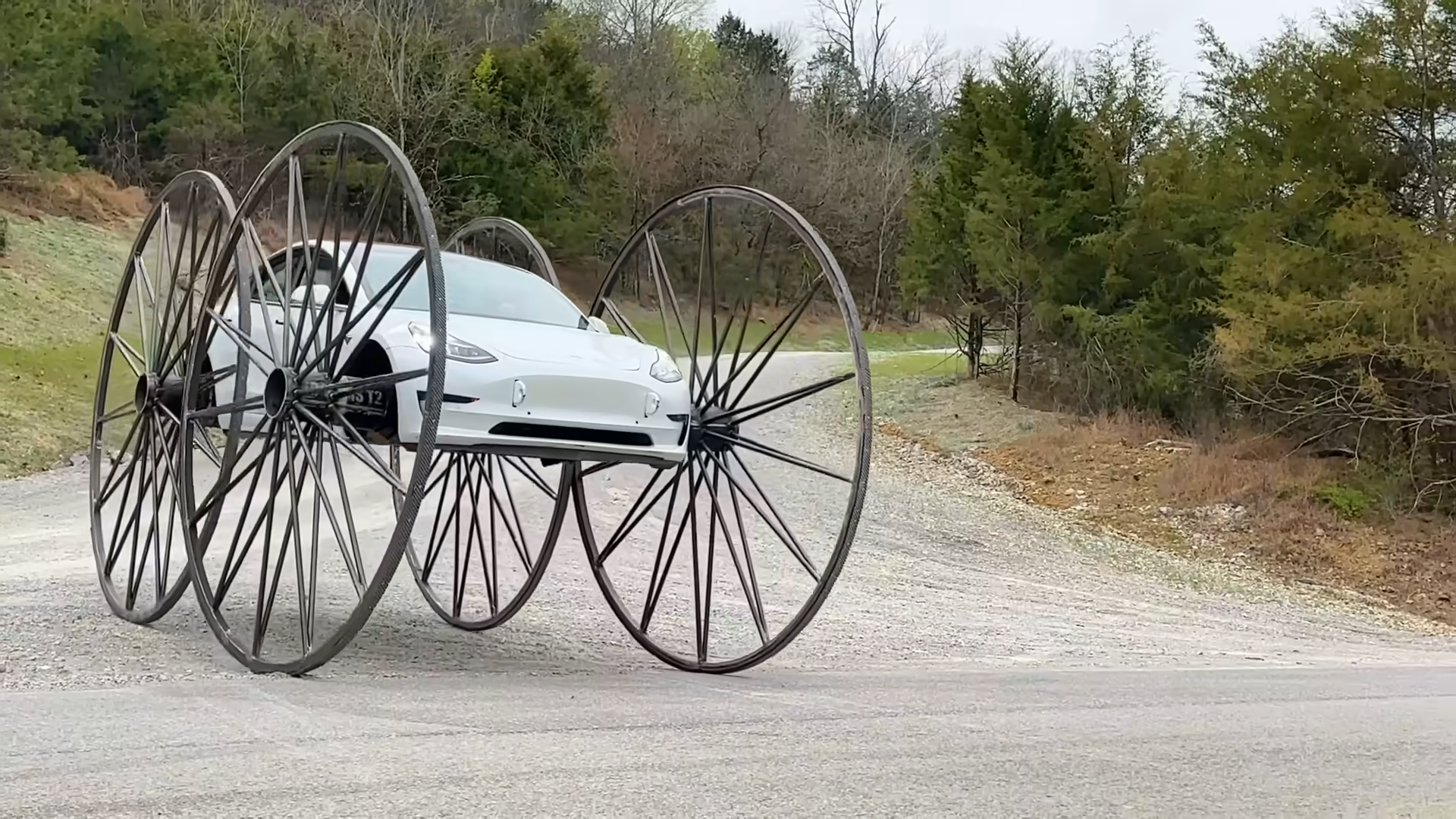 Teslas are smart - until you put 10-foot wheels on them