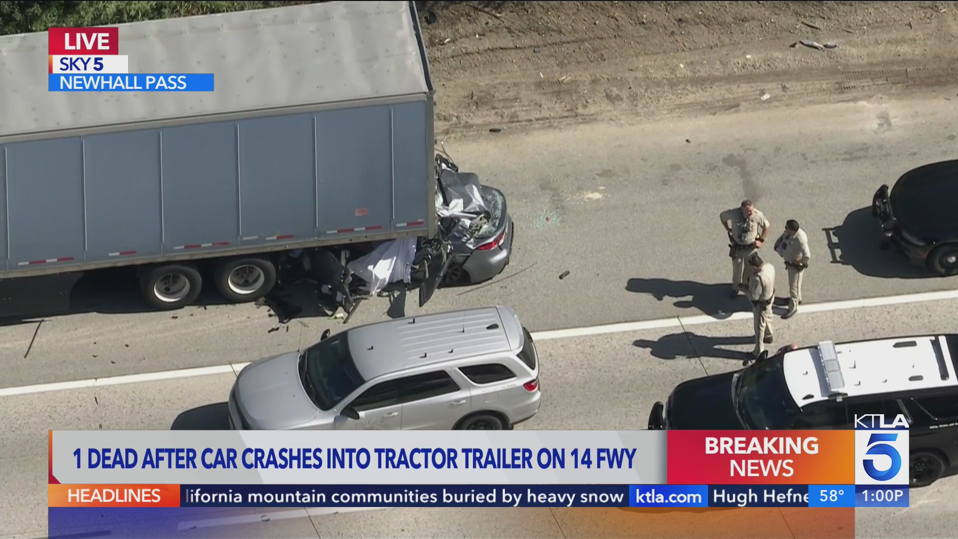 1 dead after car crashes into big rig on 14 Freeway