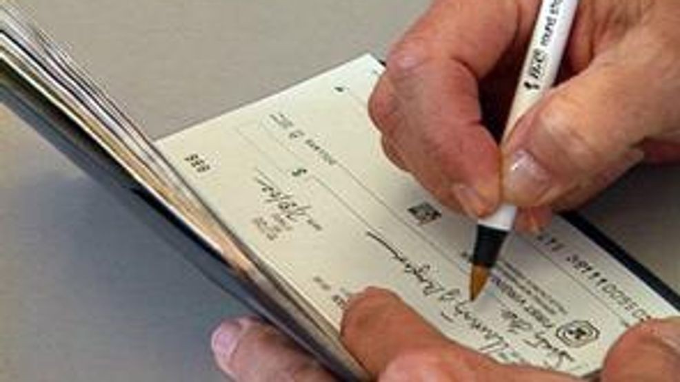 Captain, secretary of firefighters' union charged with cashing checks ...