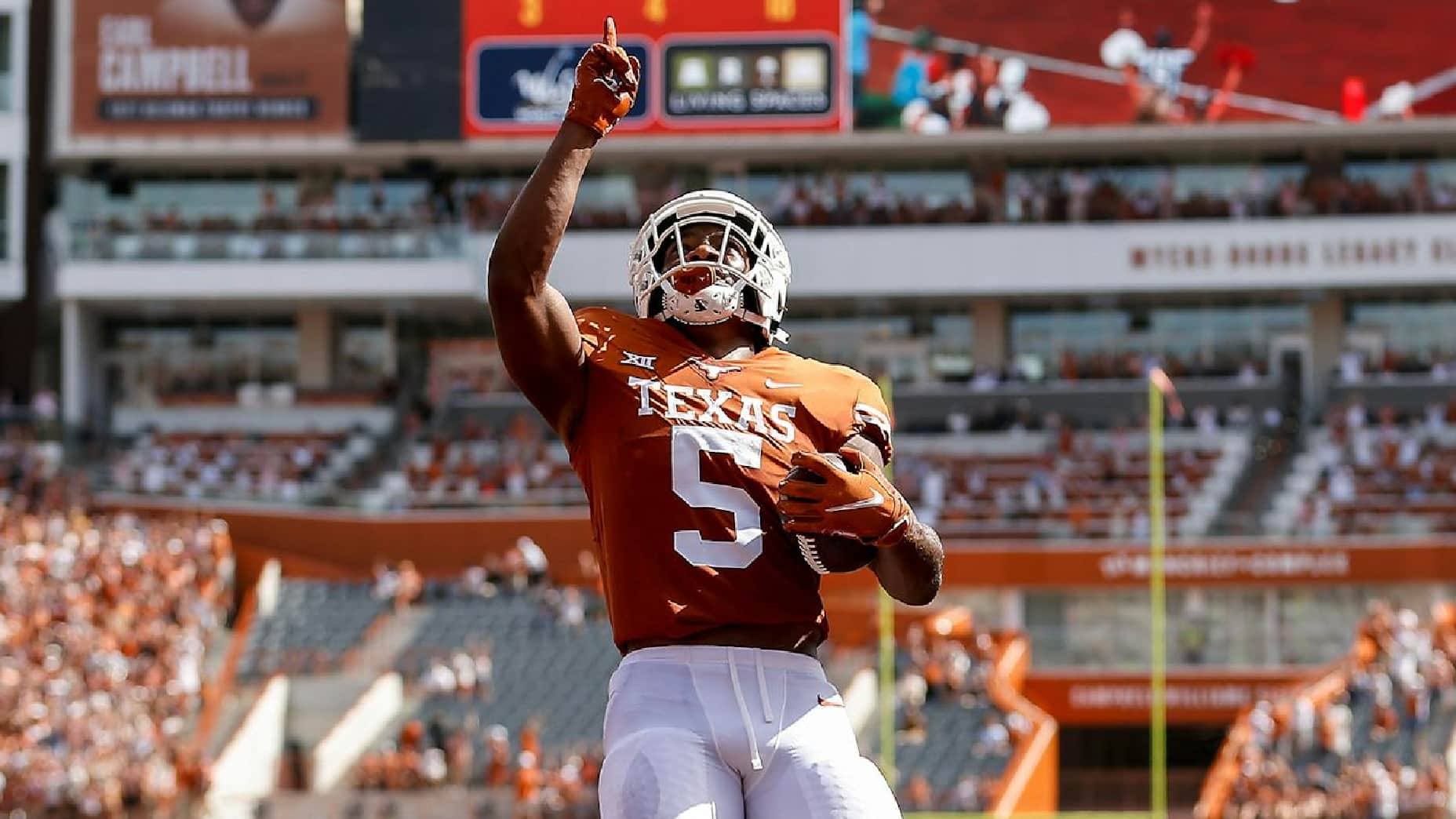 Former Texas Longhorn RB gives back .mp4