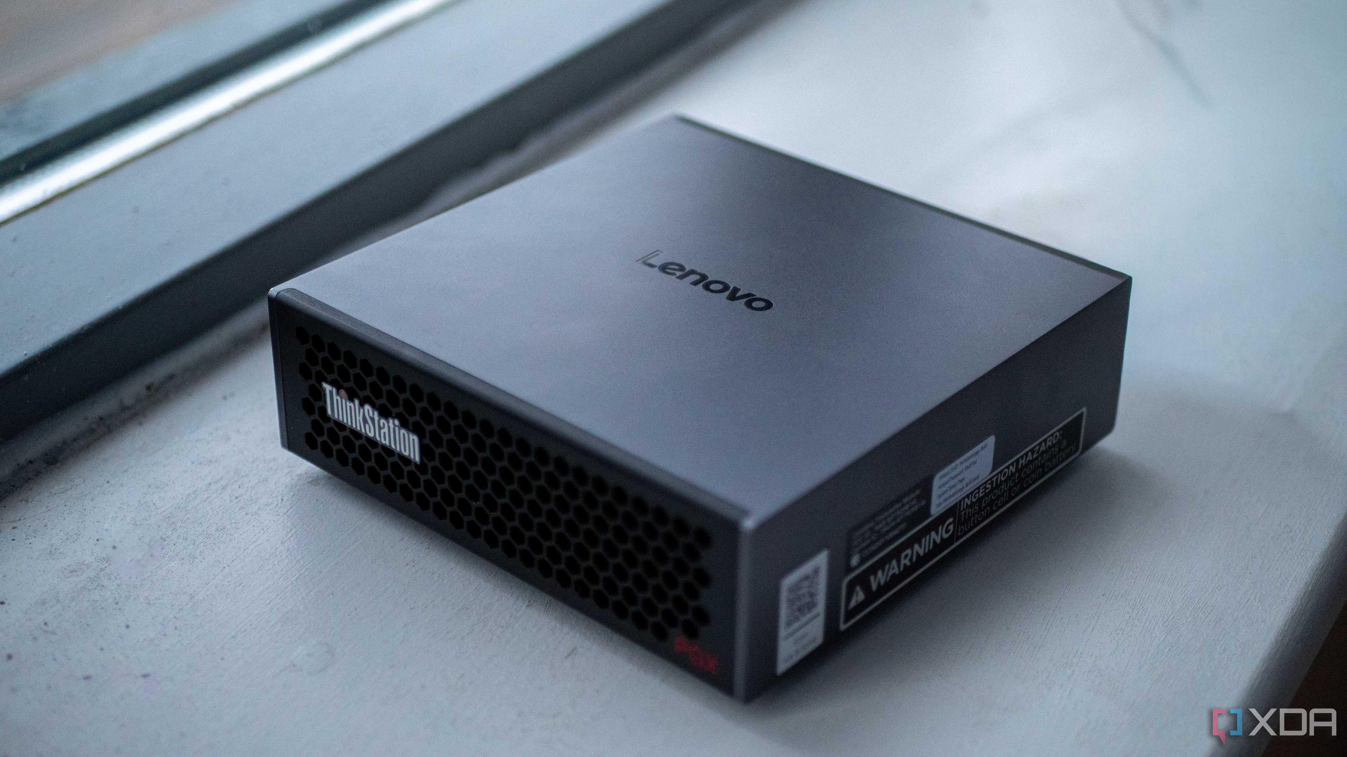 Lenovo Thinkstation PGX on a windowsill, showing the Lenovo logo