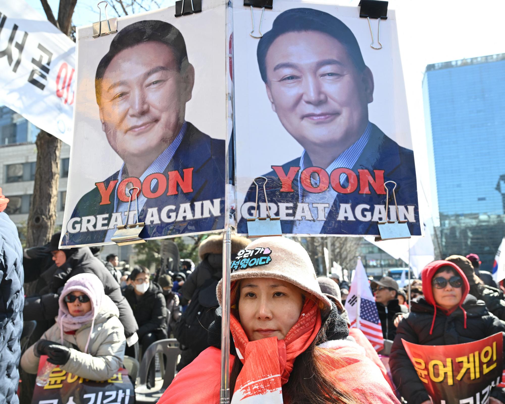 A supporter of Yoon Suk Yeol outside the court in Seoul, South Korea, on Thursday. Prosecutors argued that Yoon had committed ‘a grave destruction of constitutional order’ in 2024. Photograph: Jung Yeon-Je/AFP/Getty Images