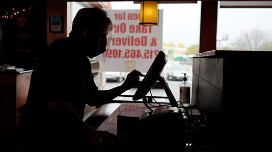 FILE - An order is entered by an employee at a diner on Nov. 17, 2020, in Philadelphia.