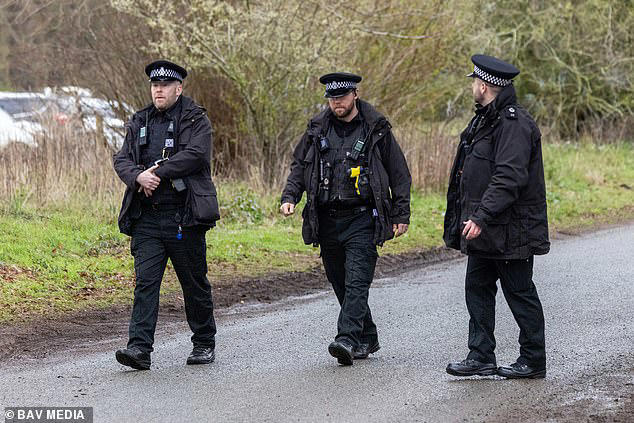 Police outside Wood Farm on the Sandringham Estate in Norfolk, where Andrew was held