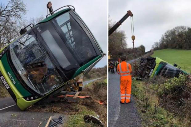 Photos show dramatic crash aftermath as double decker bus recovered