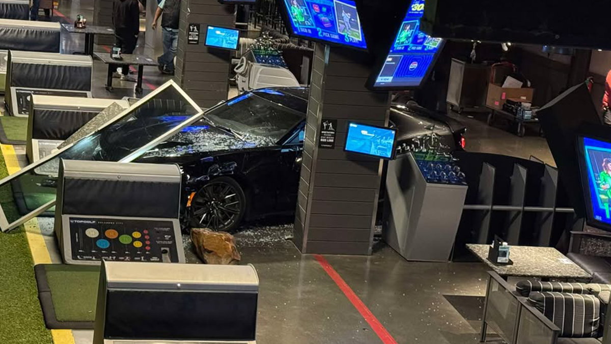Picture shows damage after drunk driver crashes into bay at OKC Topgolf
