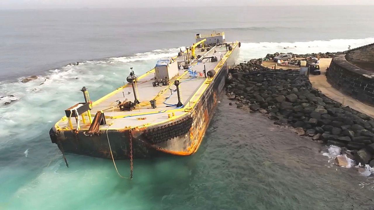 Massive fuel barge stranded after crashing onto Puerto Rico shoreline