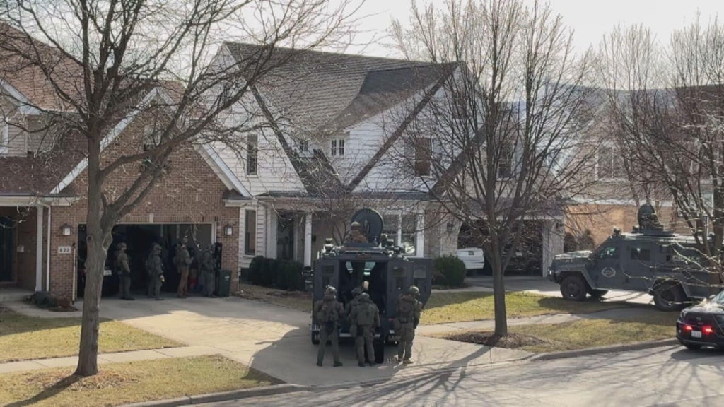 Home invader in custody after hourslong standoff with police in ...
