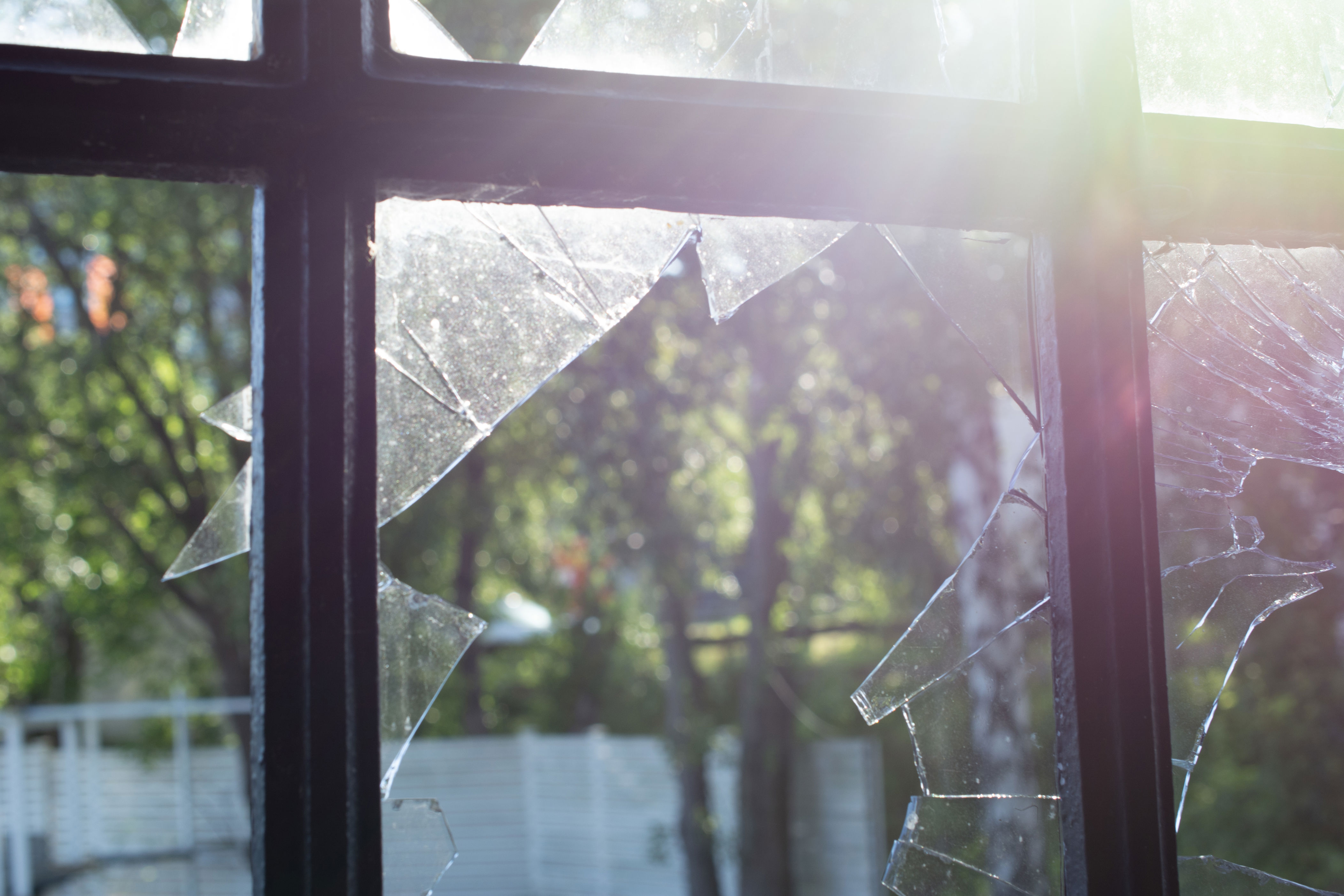 View through the hole in the broken glass