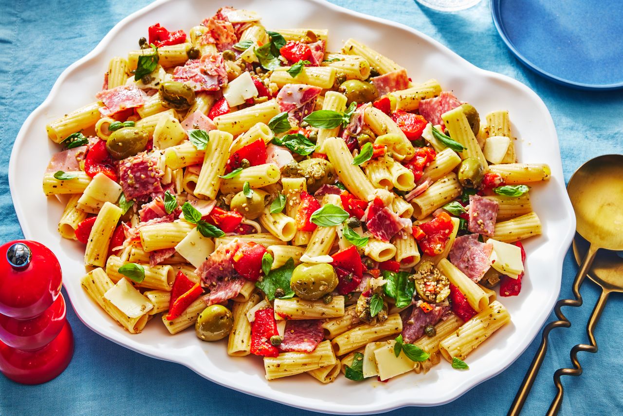Muffaleta Pasta Salad on a large white platter to serve