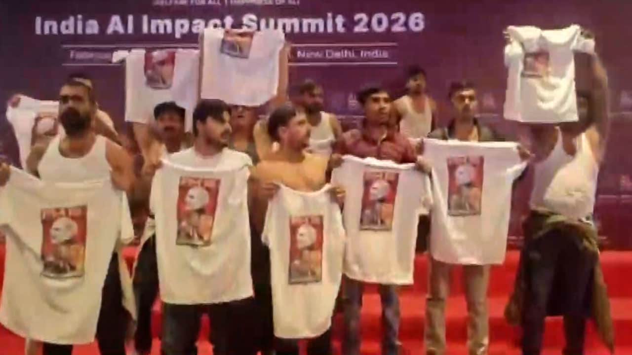 Shirts off, Youth Congress workers protest at AI summit over India-US deal