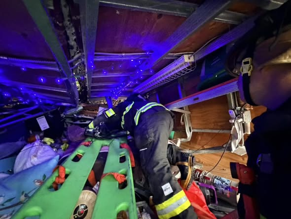 Person trapped, struggling to breathe after large tree crashes into a home
