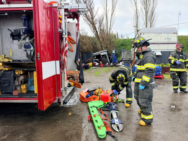 Person trapped, struggling to breathe after large tree crashes into a home