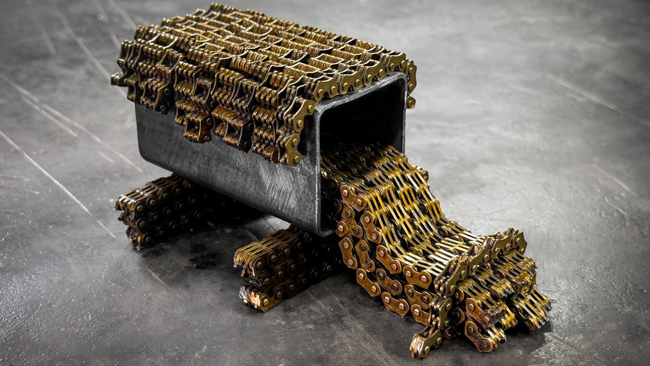 Blacksmith turns steel chains into mini Damascus cleaver