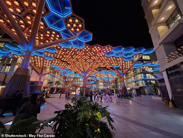 The walkway lights up at night, so you can see the crystal trees and bright colours
