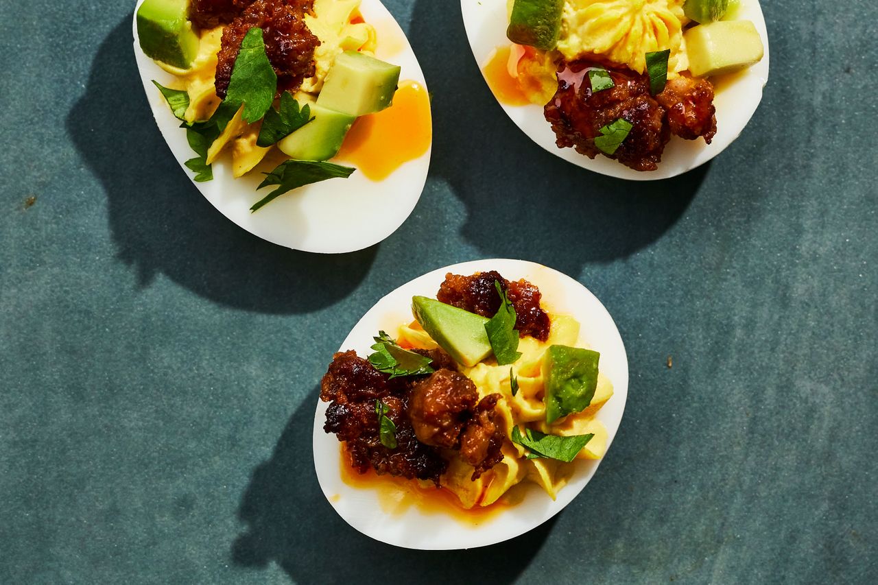 Southern Living Tex Mex Deviled Eggs on a blue surface