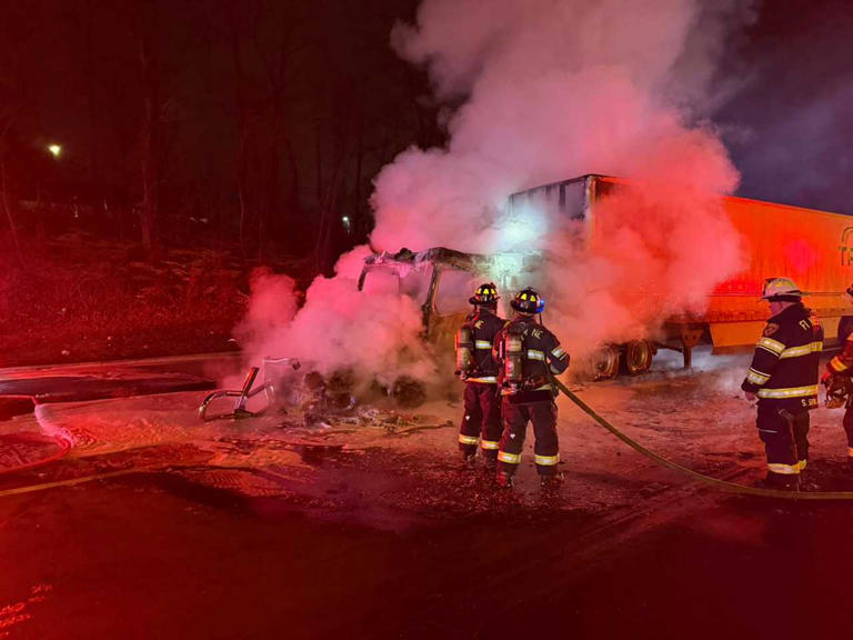 Truck hauling cookies overturns, tractor trailer engulfed in flames on ...