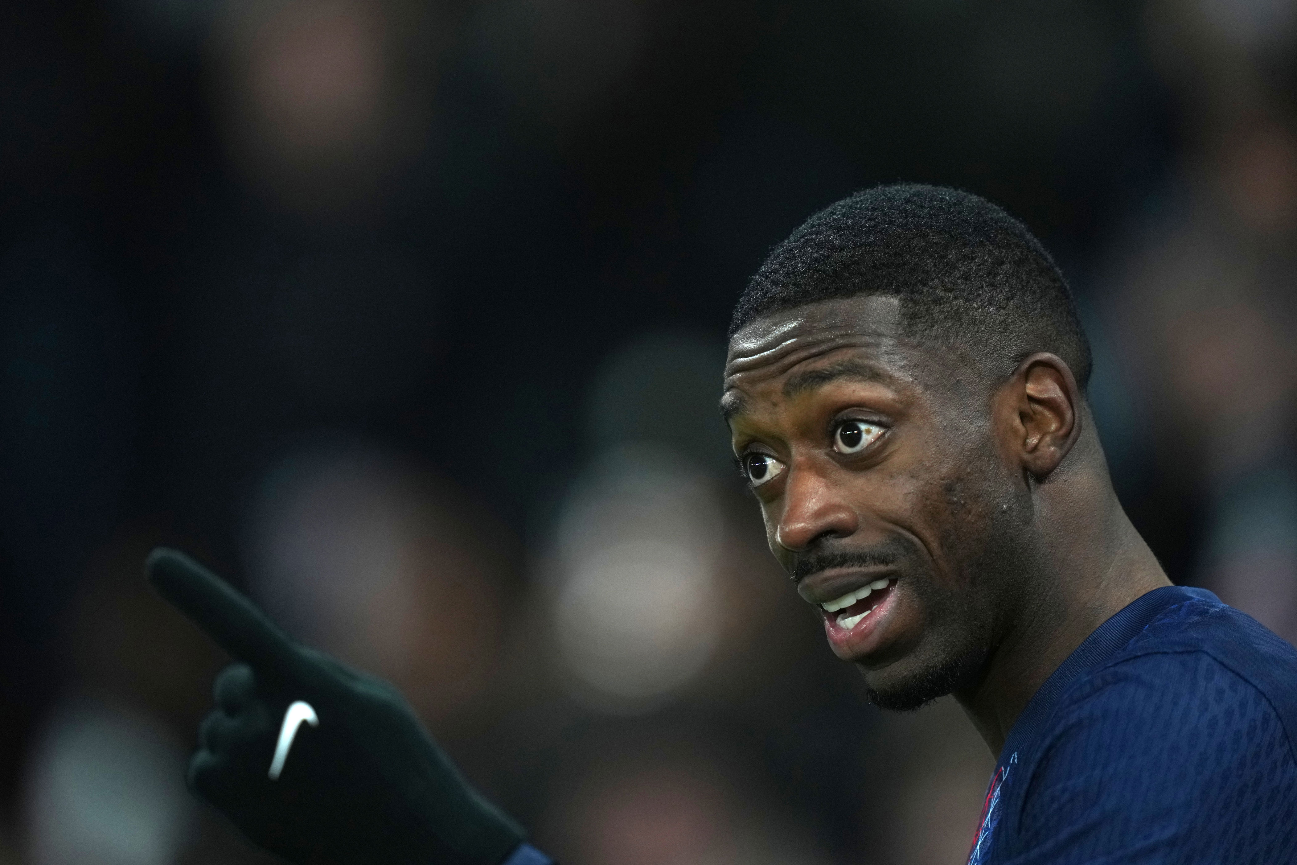 PSG's Ousmane Dembele reacts during the French League One soccer match between Paris Saint-Germain and Marseille in Paris, Sunday, Feb. 8, 2026. (AP Photo/Thibault Camus)