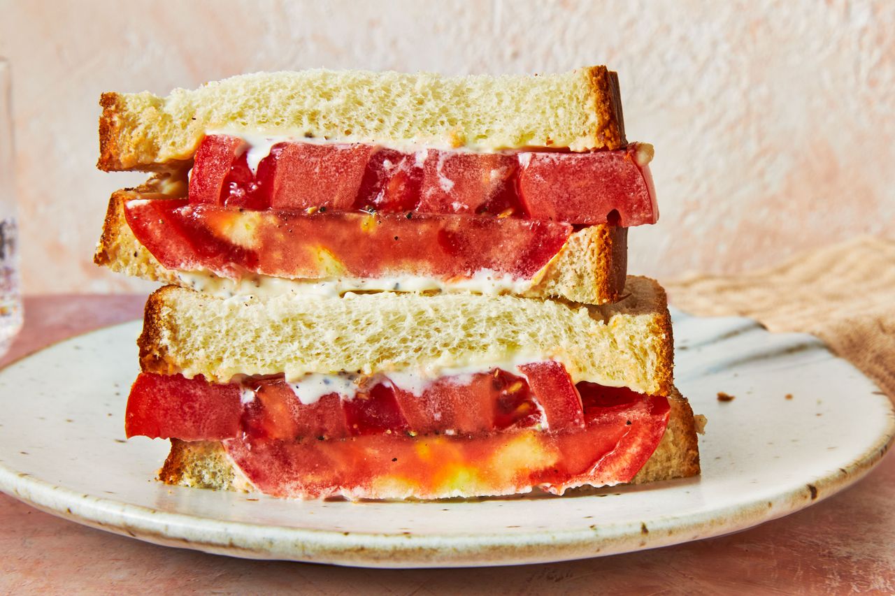 southern tomato sandwich halves on plate