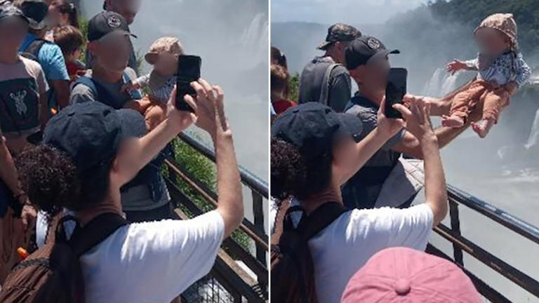 Tourist dangles baby over edge of 260ft waterfall for a holiday snap