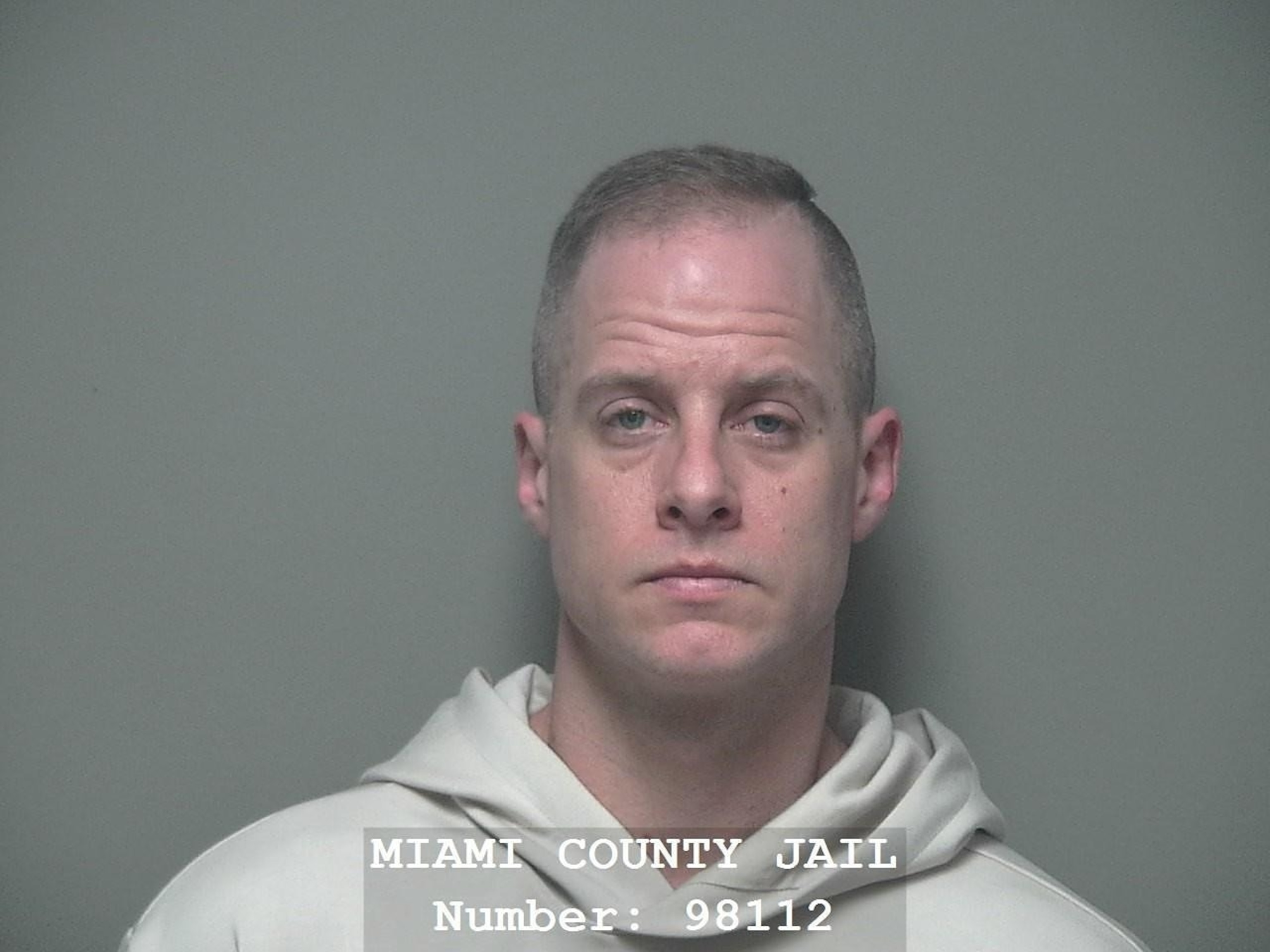 Man who called 911 to report wife shot and intruder in home charged ...