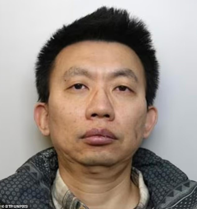 Zhijia Fan, 48, (pictured) and Daoyan Shang, 20, had been wheeling around large suitcases containing 'SMS blasters', which sent phishing messages to commuters