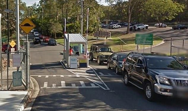 Woman is charged after male soldier is stabbed at one of Australia's ...
