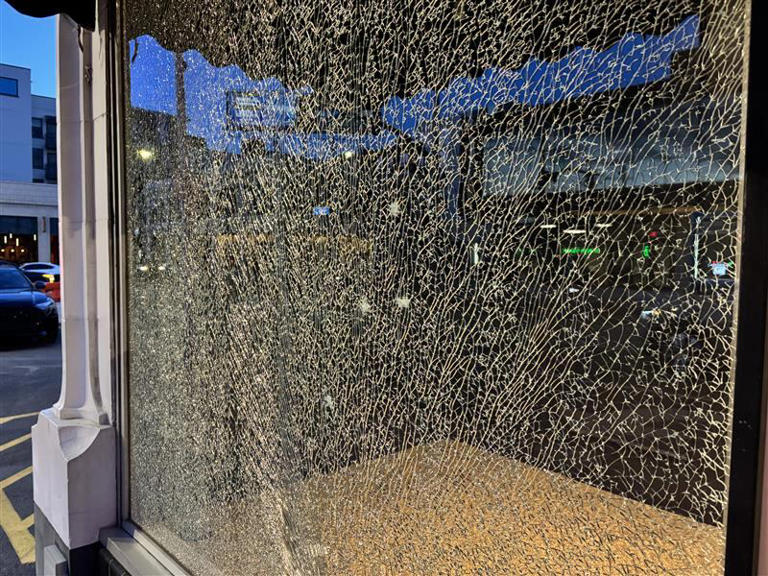 Several storefront windows smashed along Kansas City’s Main Street