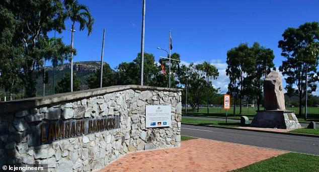 Woman is charged after male soldier is stabbed at one of Australia's ...