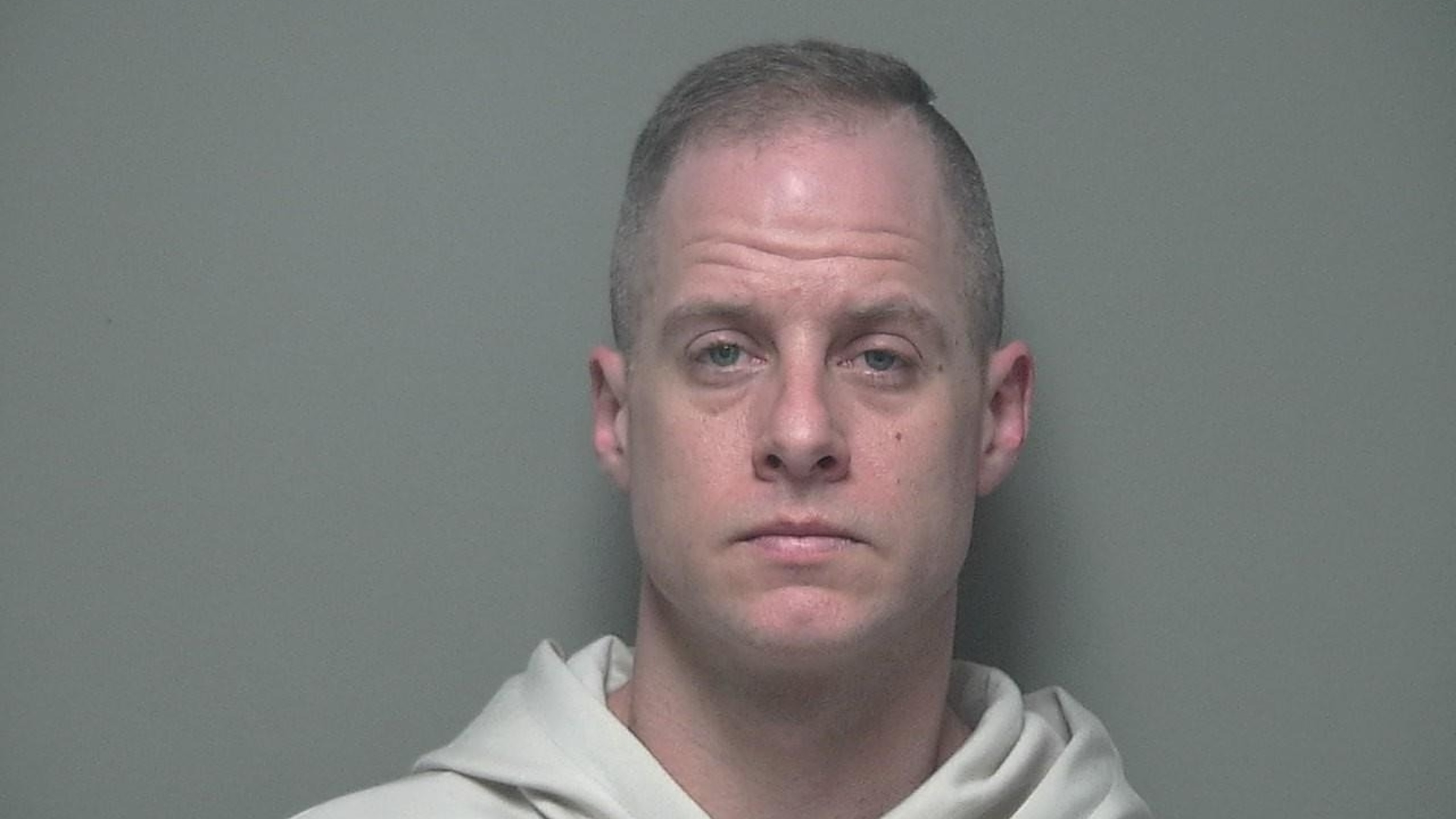 Man who called 911 to report wife shot and intruder in home charged ...