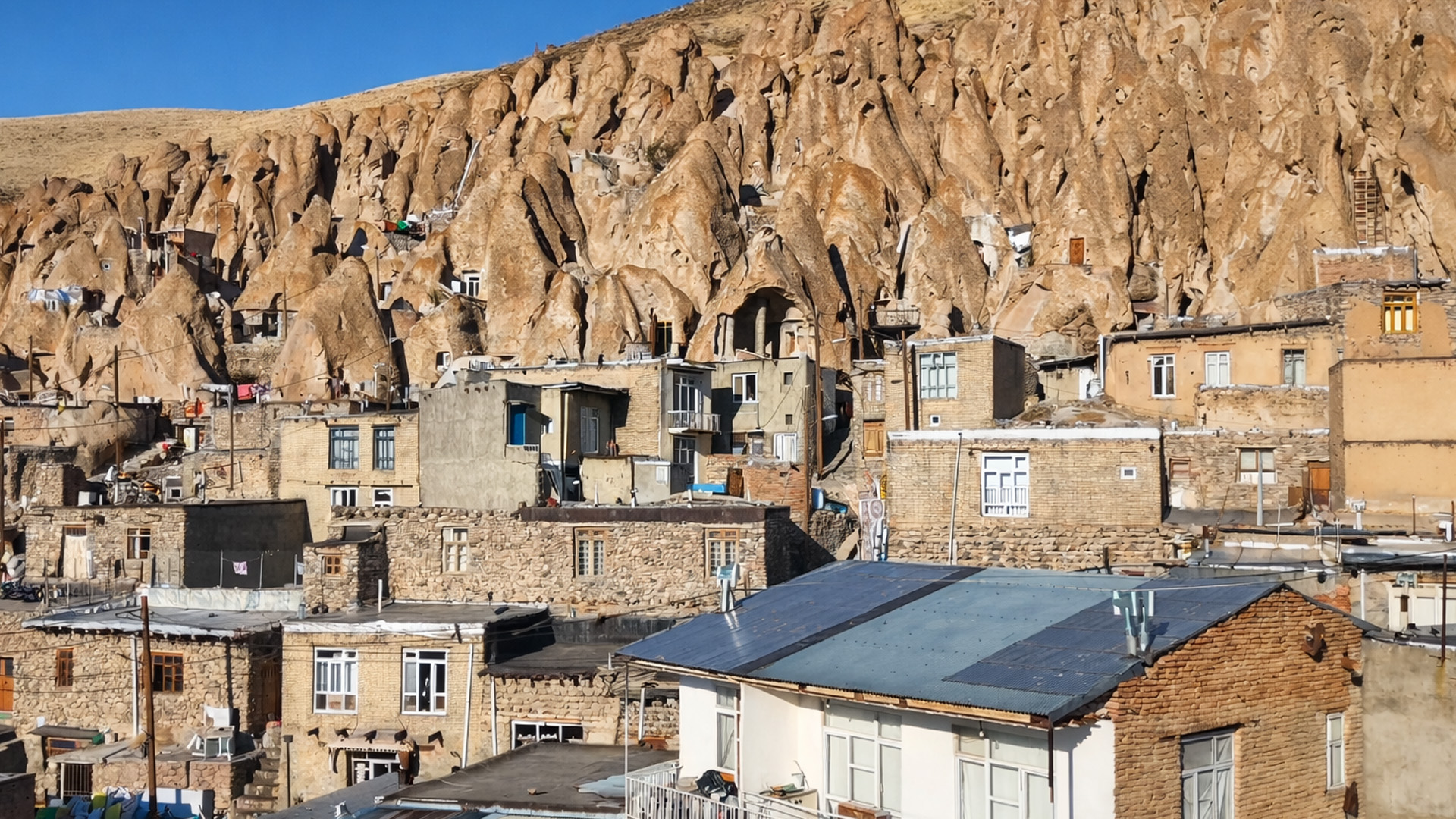 Why do people live inside these rocks?