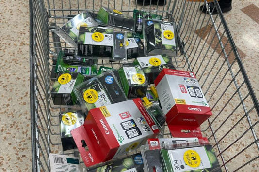 A trolley full of items in an attempted 'steal to order' stopped by shop security