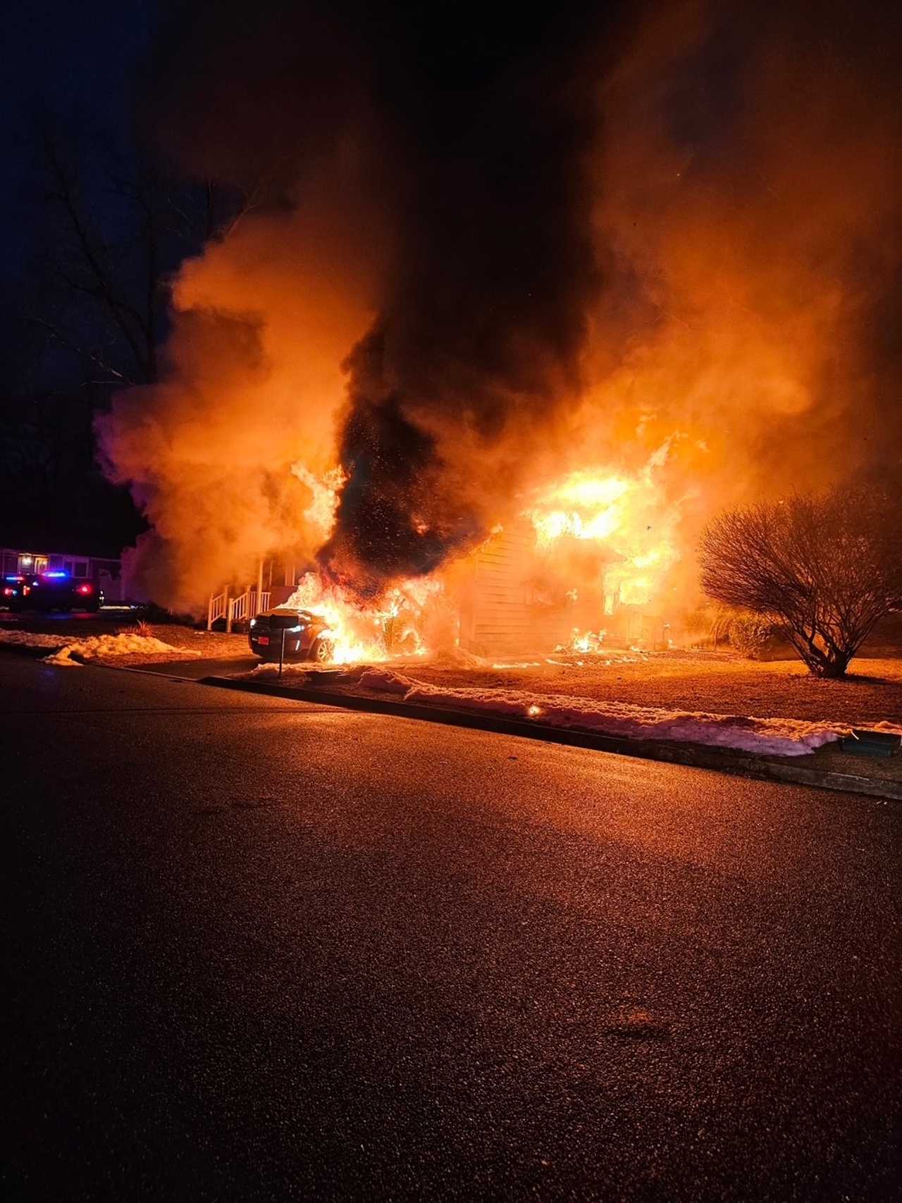 Garage, car engulfed in flames as fire rips through Jersey Shore home